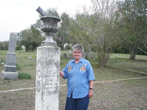 HCHC member Lu Hickey inspects one of the county's most interesting tombstones at Martin Church Cemetery.