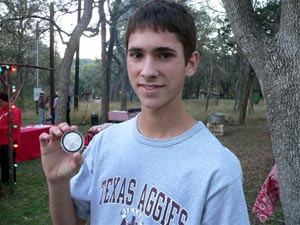 Brad Weber, son of Steven and Janice Weber of Buda, received a commemorative Eagle silver dollar from HCHC chairman Kate Johnson in recognition of Brad's massive clearing and restoration at Cocke Cemetery. He received the recognition in late 2007 on the grounds of Halifax Ranch.